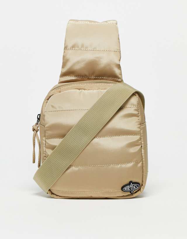 Basic Pleasure Mode - padded cross body bag in beige with gummy logo