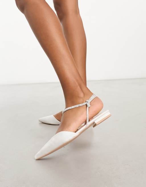 White t strap store flats