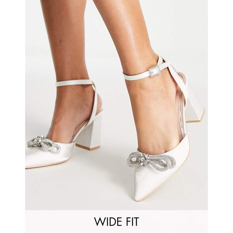 Be Mine Bridal Wide Fit Saffron bow block heel shoes in ivory satin ASOS