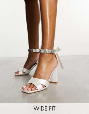 Be Mine Wide Fit Bridal Carmela block heeled sandals with embellished ribbon tie in ivory satin - ASOS Price Checker