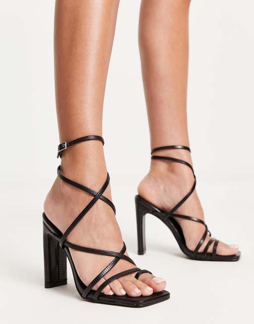 BEBO - Adelaide - Sandalen met hak, bandjes en slangenmotief in zwart