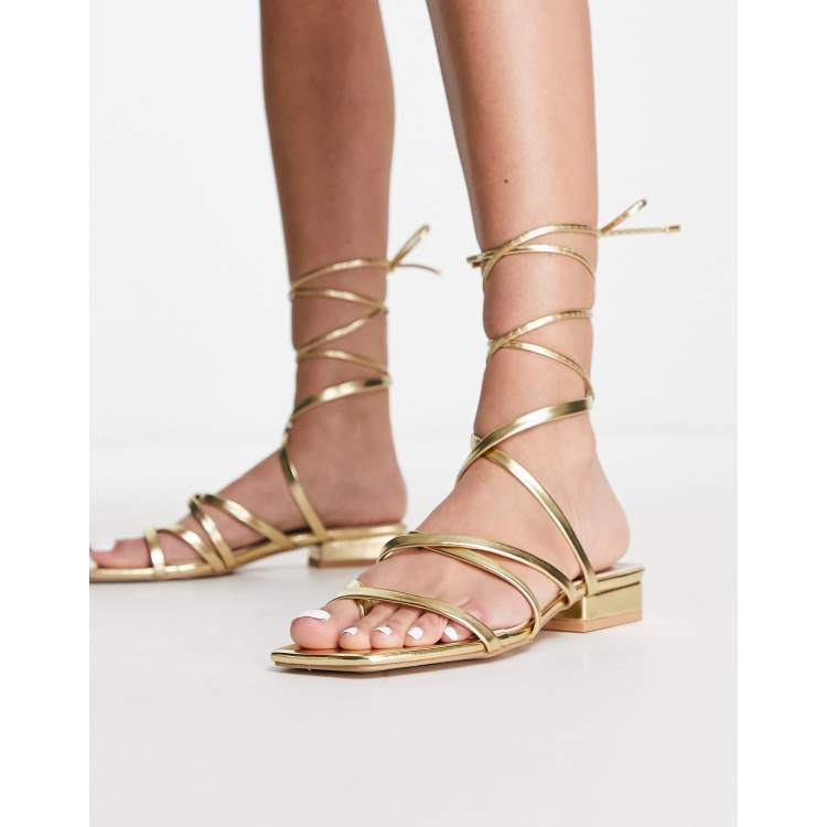 gold flat gladiator sandals