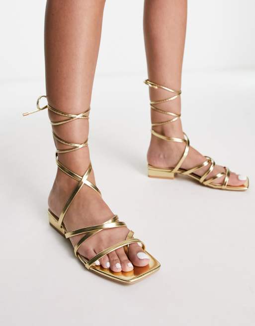 Gold strappy flat hot sale sandals uk