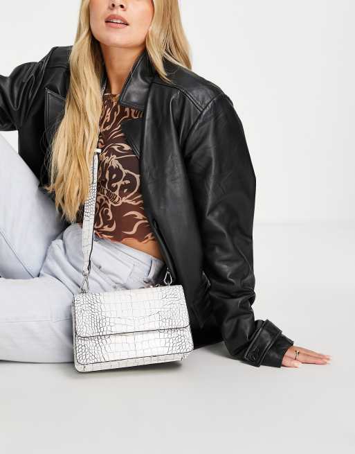 Becksöndergaard crossbody bag in white croc with pearl chain detailing 