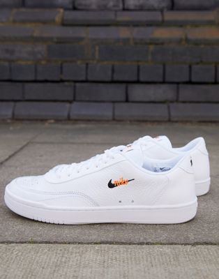 nike court vintage premium leather sneakers in white