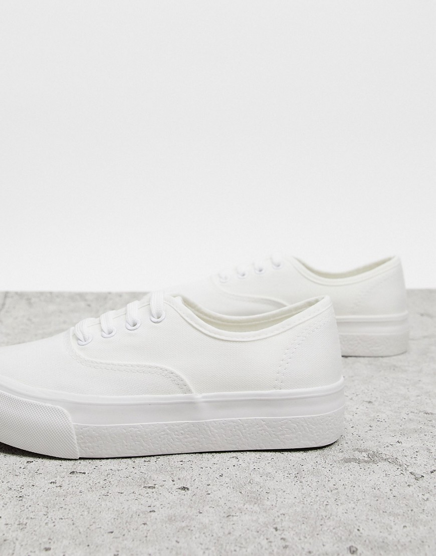 фото Белые кроссовки с контрастными строчками new look-белый