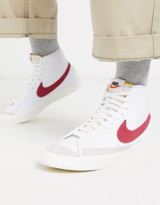 white and red nike blazers