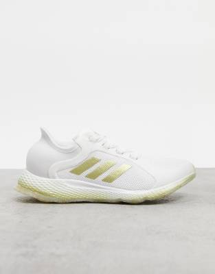 фото Белые кроссовки с золотистой отделкой adidas running focus breathe-белый adidas performance