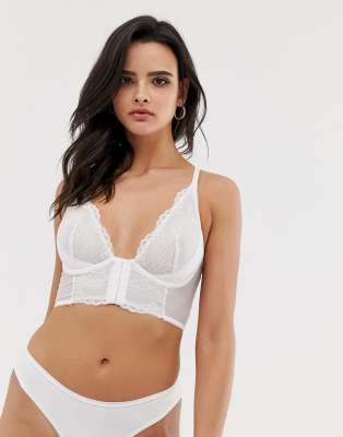 фото Белый кружевной бюстгальтер на косточках gossard superboost