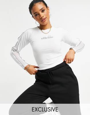 фото Белый лонгслив со светоотражающим логотипом ellesse – эксклюзивно для asos