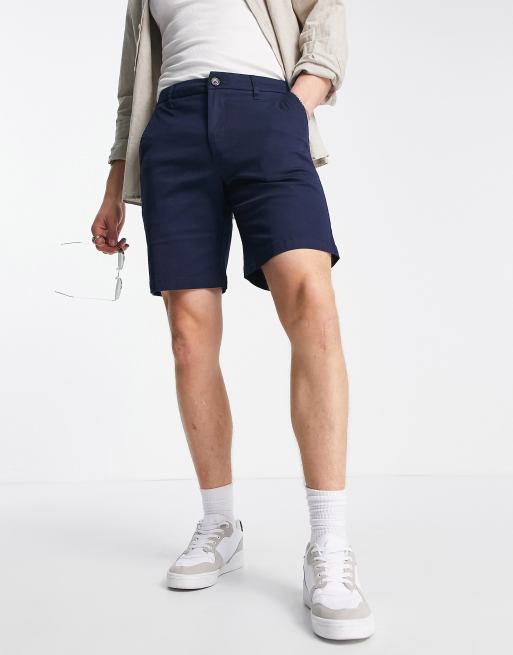 ASOS DESIGN shorter length slim shorts in washed black