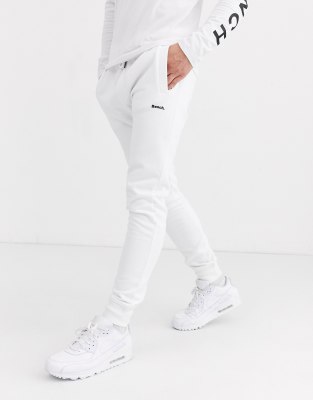 white slim joggers