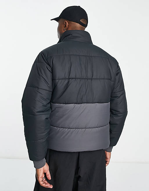 Berghaus Urban Selapass overhead puffer jacket in black | ASOS