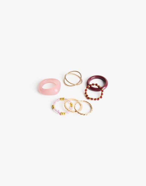 Bershka – 8 Ringe in Gold-Optik mit Strassverzierung