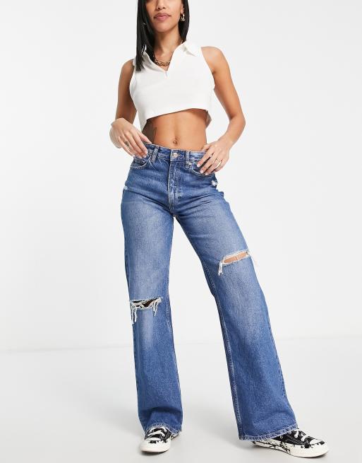 Bershka 90s clean wide leg jean in mid blue ASOS