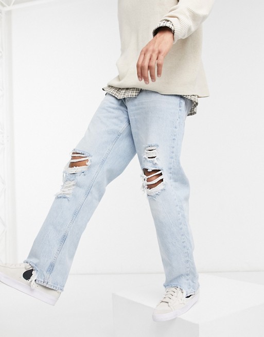 Bershka 90's fit jeans in light blue with rips