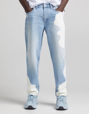Bershka 90s fit jeans with bleach out patches in blue