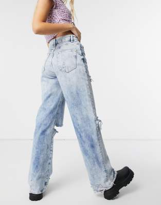 bershka 90's straight leg jeans with rips in light blue