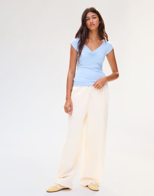 Bershka - Aangerimpeld T-shirt met korte mouwen in lichtgeel, 3 van 4