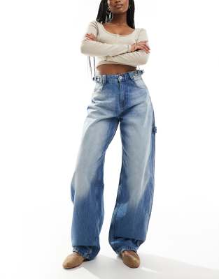 adjustable waist carpenter jeans in light wash blue