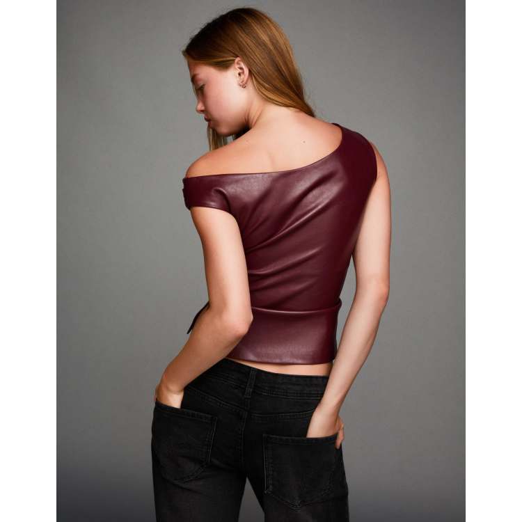 Bershka Asymmetric leather effect top in burgundy | ASOS