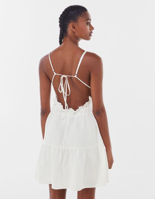 Bershka babydoll tiered summer dress with open back in white | ASOS