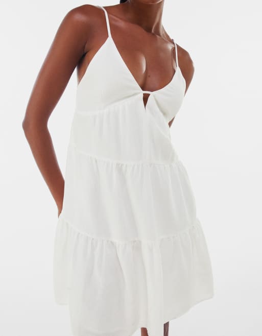 Bershka babydoll tiered summer dress with open back in white | ASOS