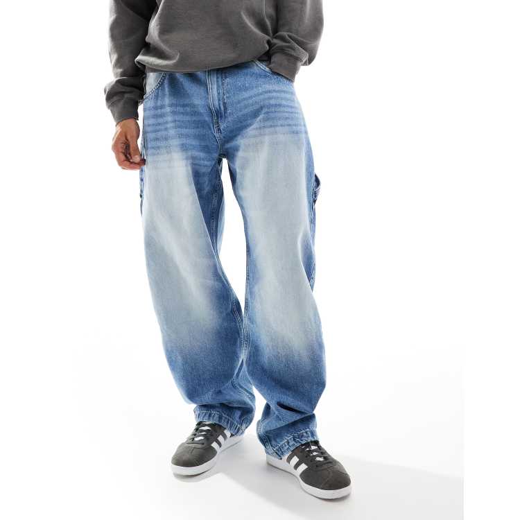 Bershka baggy carpenter jeans in mid washed blue | ASOS