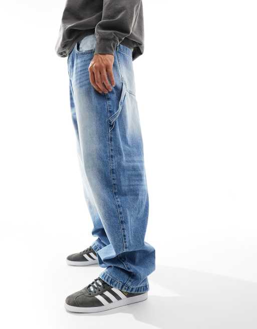 Bershka baggy carpenter jeans in mid washed blue | ASOS