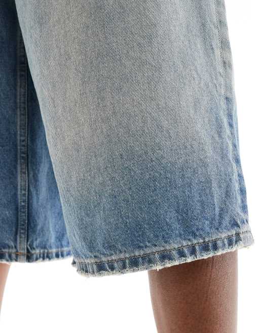 Bershka baggy denim jorts in light blue wash | ASOS