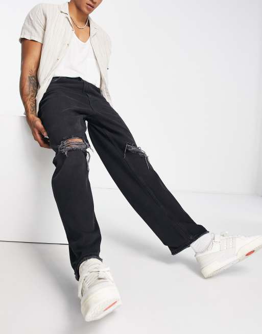 Bershka Baggy gescheurde jeans in zwart ASOS