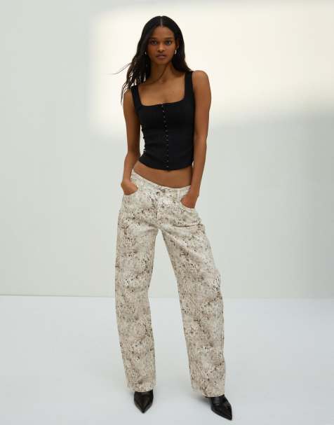 Bershka - Baggy jeans met lage taille, print en textuur in ecru - view 1