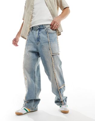 baggy jeans with frayed seams in blue