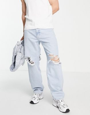 Bershka baggy jeans with rips in faded blue