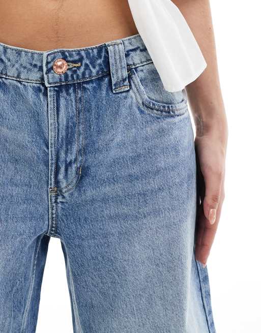 Bershka baggy longline denim shorts in washed blue