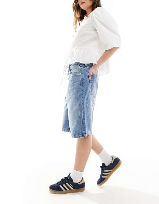 Bershka baggy longline denim shorts in washed blue
