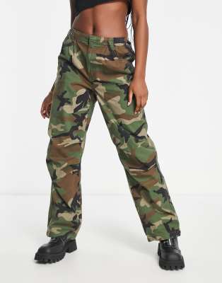 Bershka baggy parachute tech pant in camo