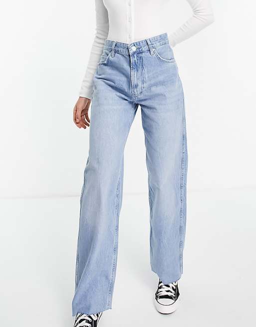 Bershka baggy raw hem jeans in blue | ASOS