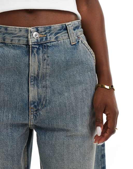 Bershka コーティングデニム Bershka baggy skater jeans in dirty mid wash blue | ASOS