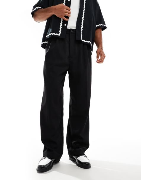 Bershka baggy tailored pants in black - view 1