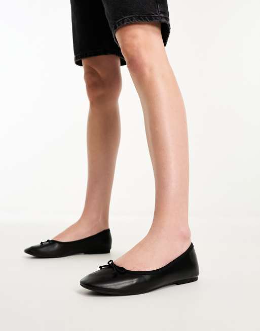 schuh Leigh ballet flats with bow in black patent