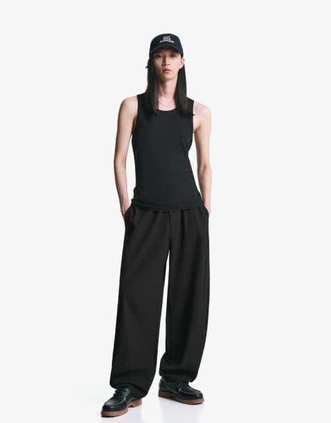 Bershka Balloon fit trousers in black - view 1