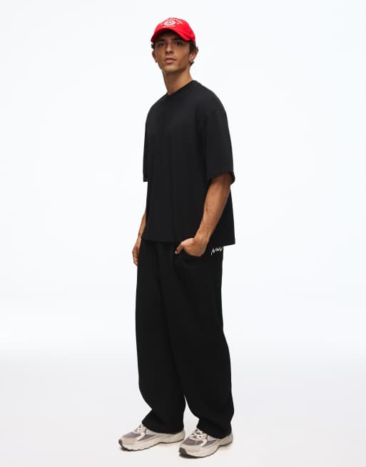 Bershka Balloon tailored waffle trousers with 3d embroidery in black, 2 of 5