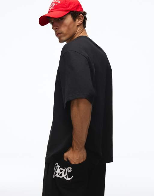 Bershka Balloon tailored waffle trousers with 3d embroidery in black, 3 of 5