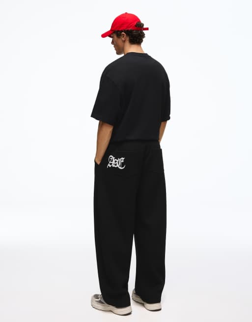 Bershka Balloon tailored waffle trousers with 3d embroidery in black, 4 of 5