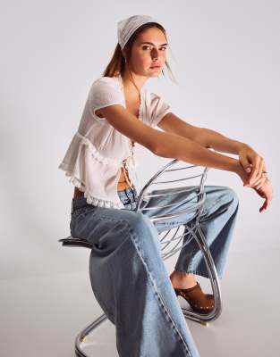 Bershka - Bandana brodé en fausse fourrure - Blanc