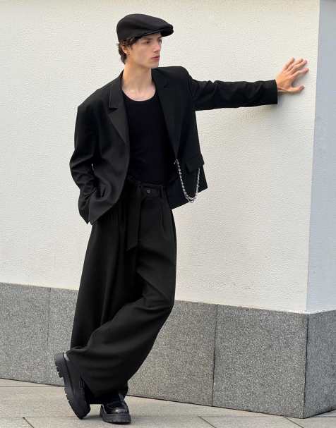 Bershka Barrel-leg tailored fit trousers with belt in black