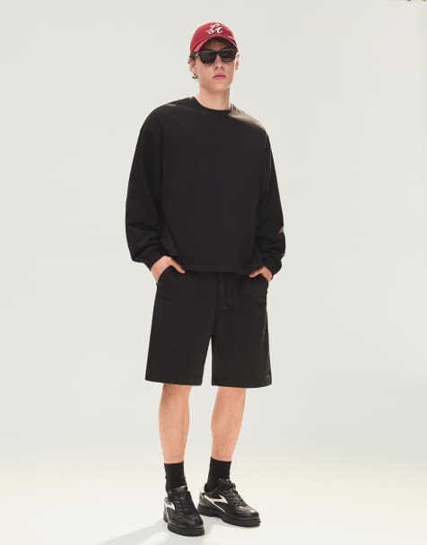 Bershka Basic fleece bermuda shorts in black - view 1