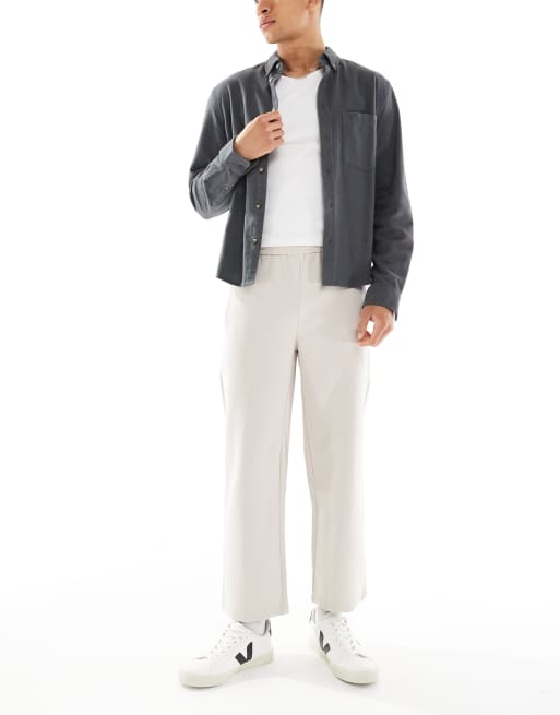 Bershka – Beige figursydda byxor med vida ben