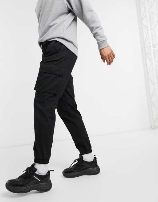 Bershka belted cargo pants in black | ASOS